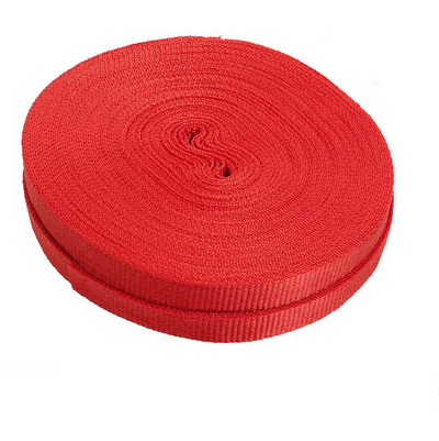 A roll of red polyester webbing strapping.