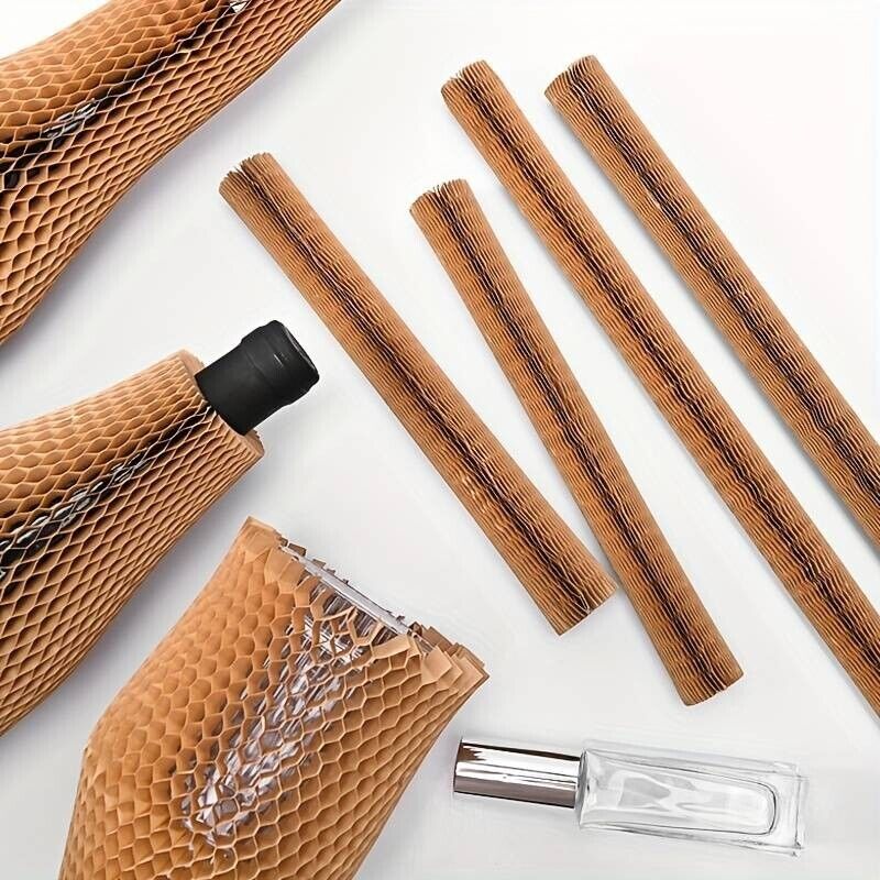 A series of brown kraft paper expanding glass bottle sleeves with a honeycomb pattern, designed to protect wine bottles, laid out on a white surface.