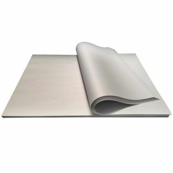 A sheet of butchers paper partially covering another sheet, displaying a smooth white surface.
