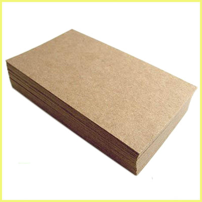 A stack of brown kraft A4 sized recycled paper sheets