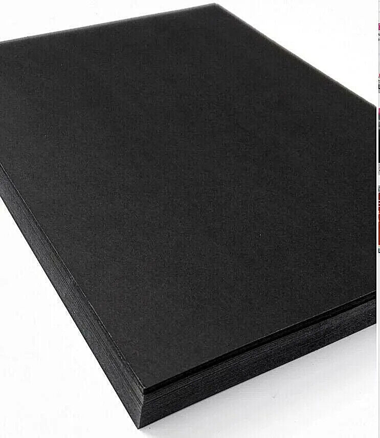 Stack of black kraft paper sheets, A3 size, displayed on a white background.