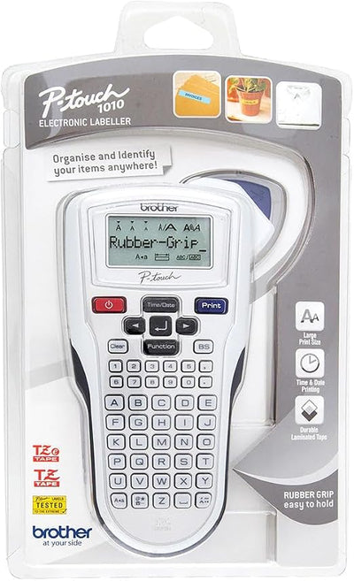Brother PiTouch 1010 Electronic Labeleller in a white rubber grip design, shown in its original retail blister packaging with a clear plastic cover.