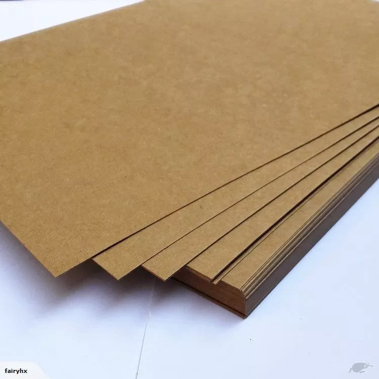 A stack of brown kraft paper sheets A3 size, 225GSM, displayed on a white background.