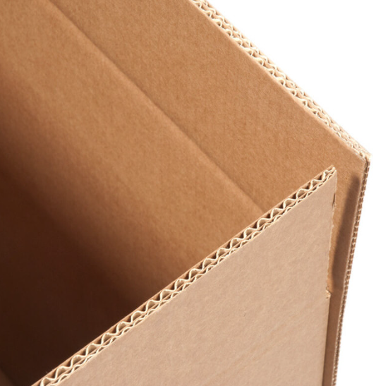 Cardboard tea chest cartons with sticky tape and markers