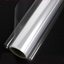 A roll of clear cellophane wrap, typically used for gift presentations or packaging.