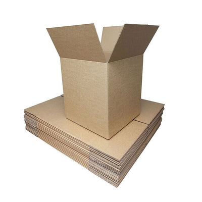 A stack of brown cardboard packing boxes with one box partially opened on top.