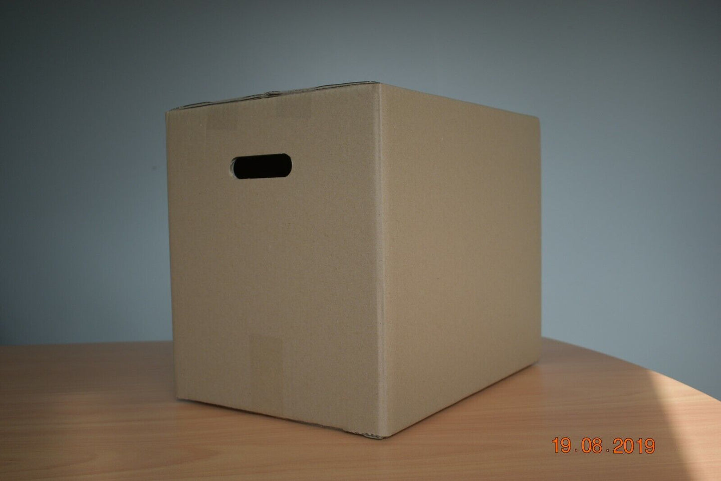 Double ply moving cardboard boxes with handles