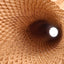 Expanding honeycomb paper sleeve for glass bottle