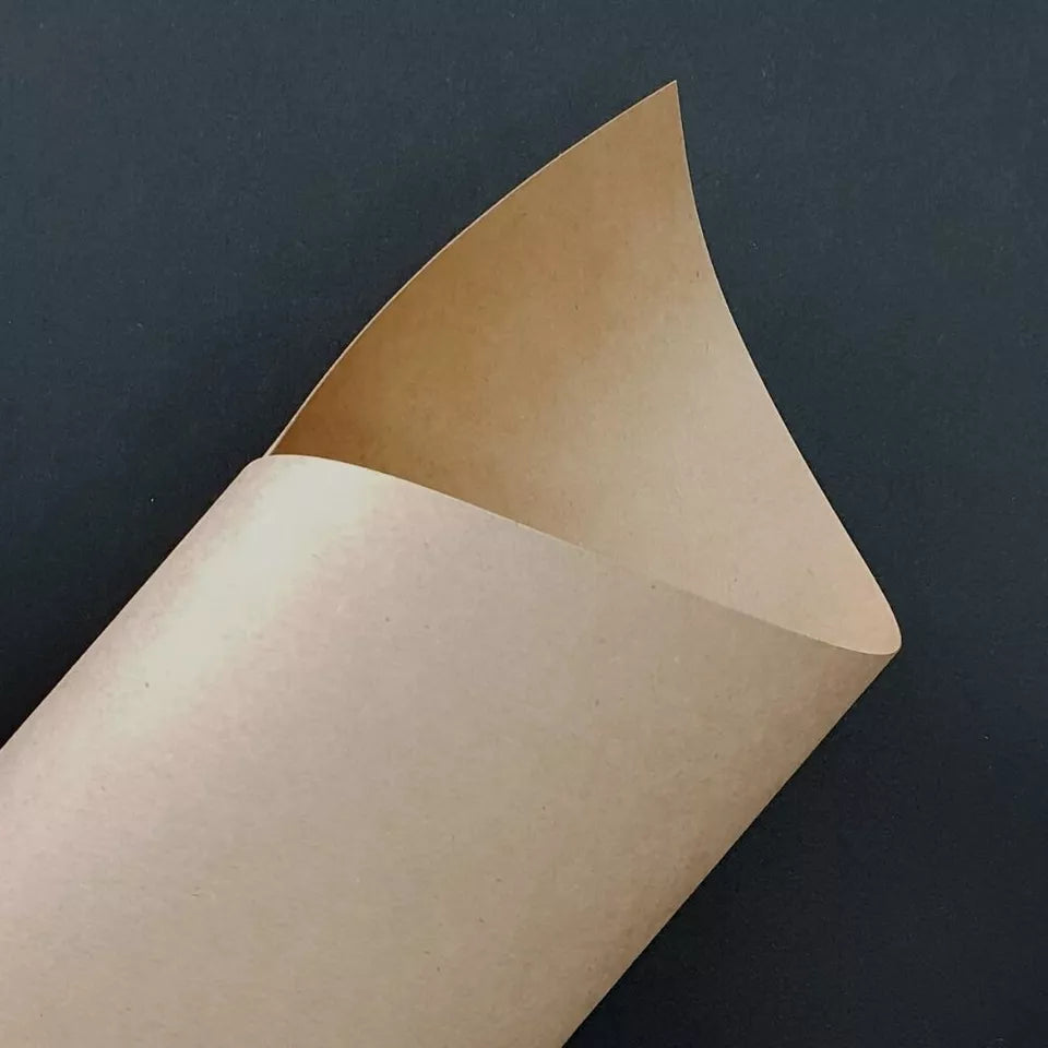Heavy-duty brown kraft paper roll for creative and packaging use