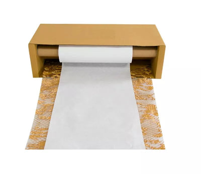 A roll of honeycomb kraft paper wrap with white tissue paper partially unrolled, displayed on a flat surface.
