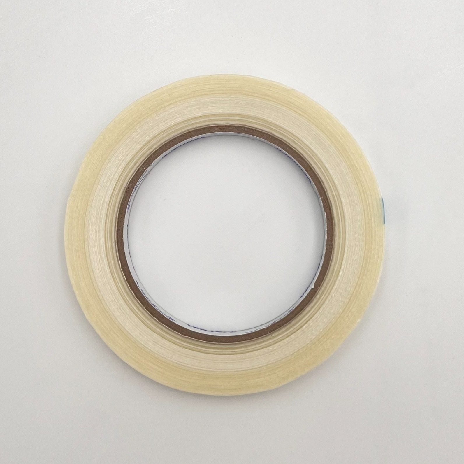 Industrial two-way reinforced glass fibre tape with PET film backing