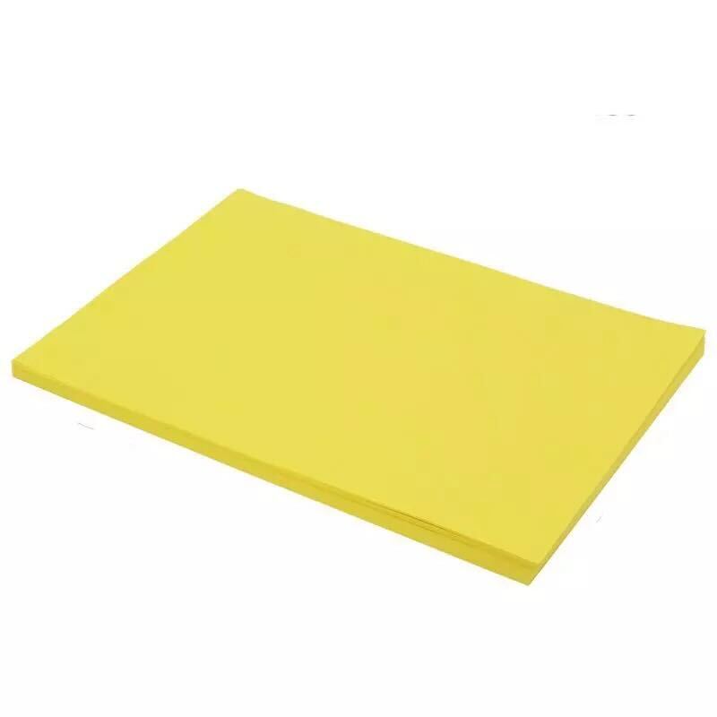 Yellow cutting board on a white background