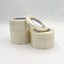 Three rolls of clear adhesive tape stacked on a light gray background.