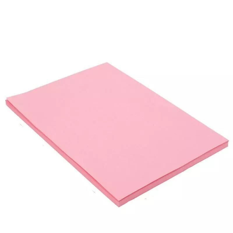 Pink sheet of paper on a white background