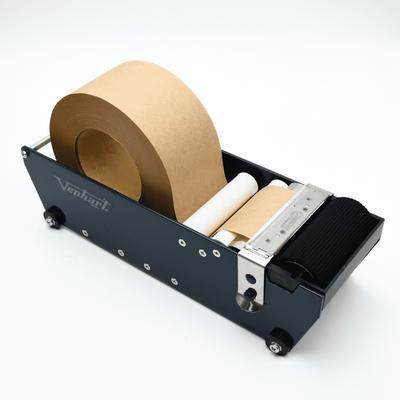 Tape dispenser with rolls of tape on a white background