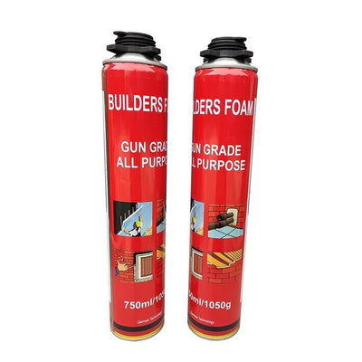 Two red cans of builders foam on a white background