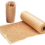A brown honeycomb kraft paper roll with a small portion of the roll partially unrolled, along with some beige twine and a glass bottle for scale.