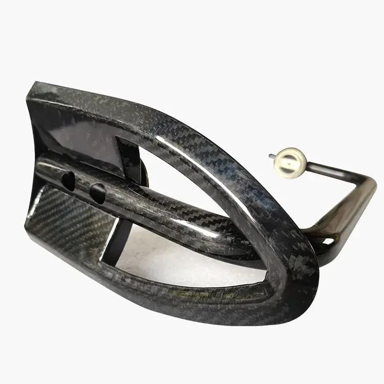Carbon fiber archery bow nocking block on a white background