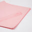 Stack of pink paper on a white background