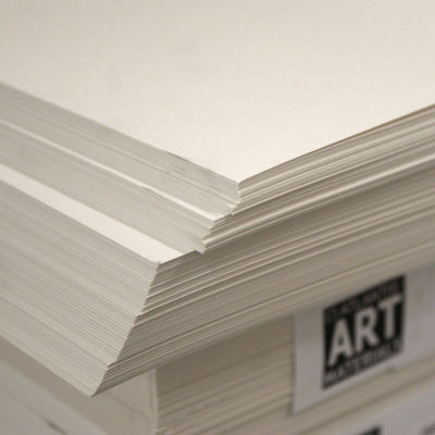A stack of white, acid-free cartridge paper with a label that says 'ART & CRAFT PAPER'.
